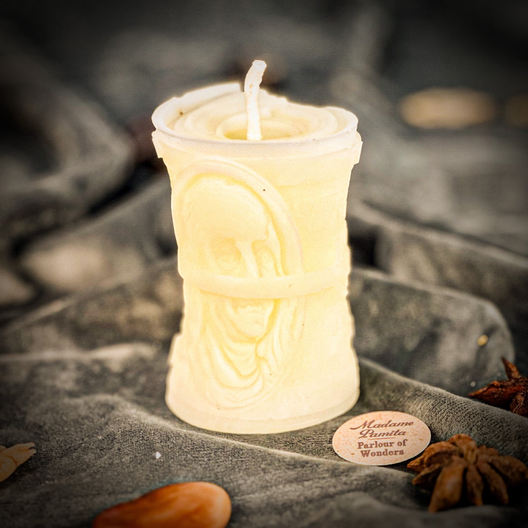 Green beeswax candle from Parlour of Wonders, designed for debt collection and fair compensation spells.