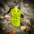Green beeswax candle by Parlour of Wonders, designed for debt collection and fair compensation spells.