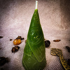 Green beeswax candle by Parlour of Wonders for prosperity and abundance magic, featuring a sleek, natural beeswax design.