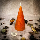 Green beeswax candle by Parlour of Wonders for prosperity and abundance magic, featuring intricate beeswax design.