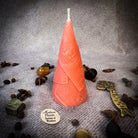 Green beeswax candle by Parlour of Wonders for prosperity and abundance magic, featuring a beeswax money maker spell design.