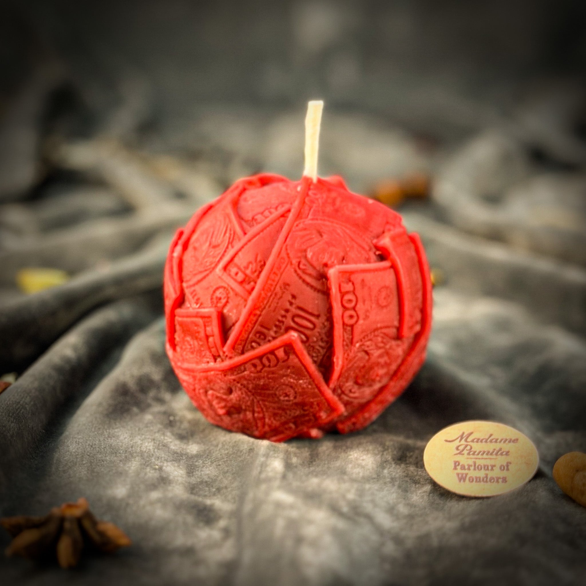 Green beeswax candle with rolling dough design by Parlour of Wonders, symbolizing luxury, wealth, and abundance.