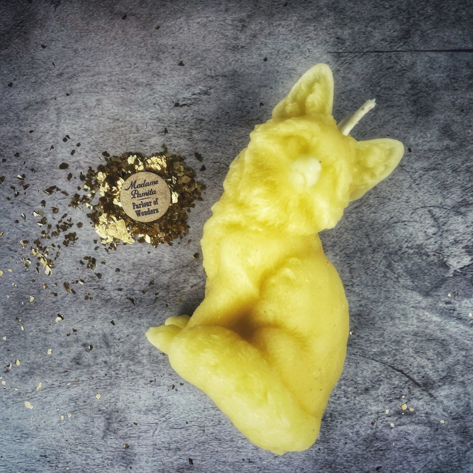 Beeswax Fox Spell Candle by Parlour of Wonders, orange beeswax candle for quick results and cunning magic.