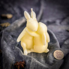 Beeswax Rabbit Spell Candle by Parlour of Wonders with orange wax and rabbit design, symbolizing good luck and new beginnings.