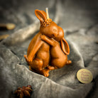 Orange beeswax rabbit spell candle by Parlour of Wonders, symbolizing good luck and new beginnings.
