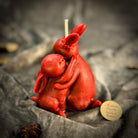 Beeswax Rabbit Spell Candle by Parlour of Wonders featuring an orange rabbit design for good luck and new beginnings.