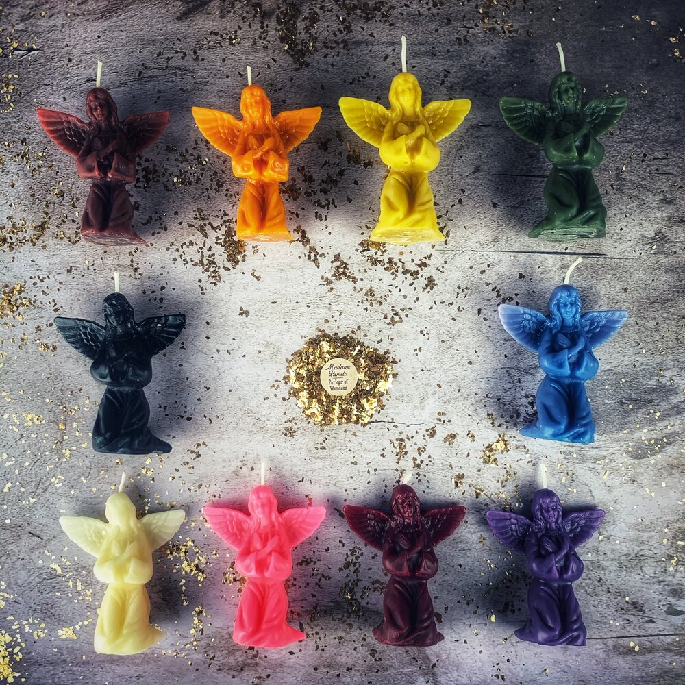 Orange beeswax angel spell candle by Parlour of Wonders, designed for connecting with spirit guides and divine blessings.
