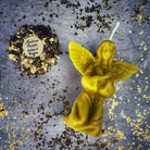 Orange beeswax angel spell candle by Parlour of Wonders for connecting with spirit guides and divine blessings.