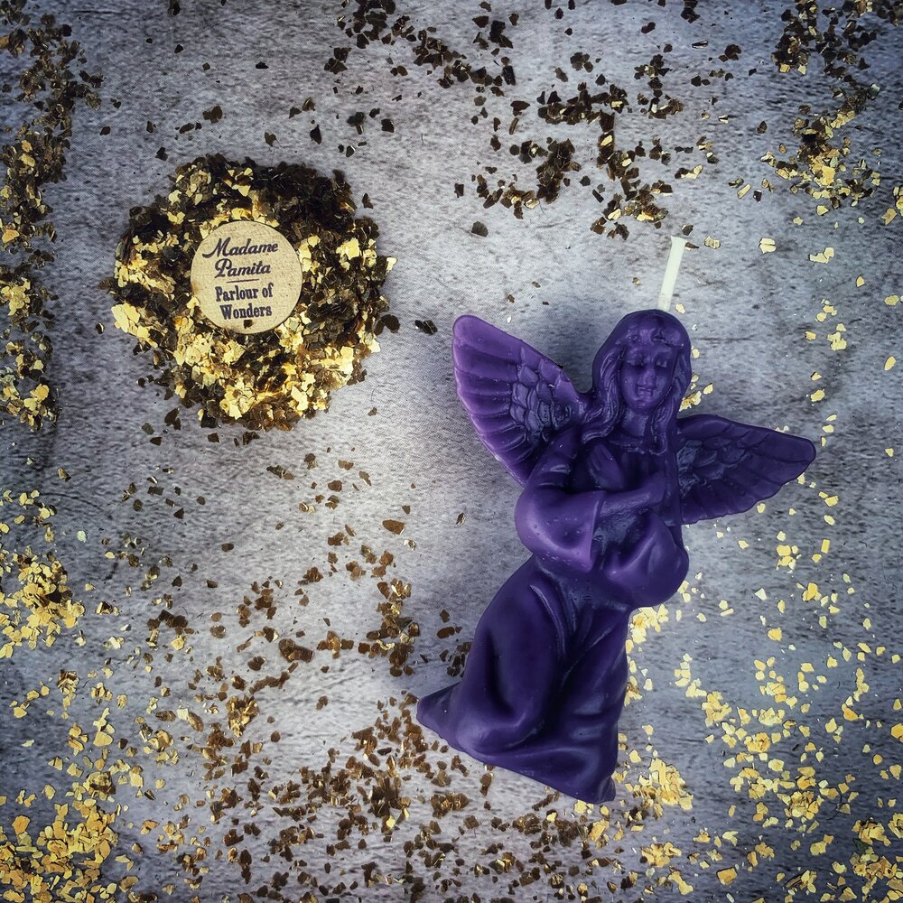 Orange beeswax angel spell candle by Parlour of Wonders, designed for connecting with spirit guides and divine blessings.