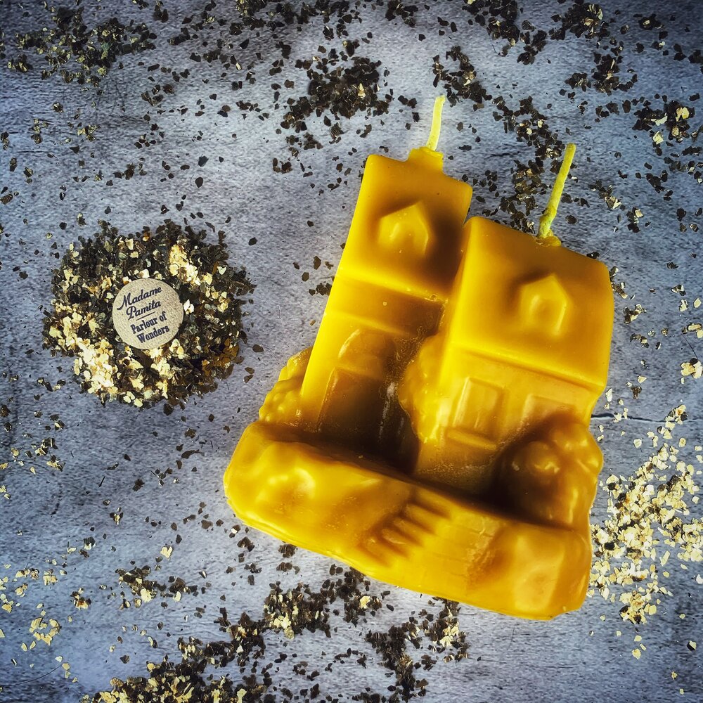 Beeswax Happy House Spell Candle by Parlour of Wonders, orange beeswax candle for home protection, harmony, and blessings.