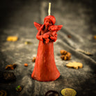 Beeswax Dog Guardian Spirit Candle by Parlour of Wonders with orange wax for pet protection and healing.