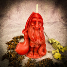 Beeswax Domovyk House Gnome spell candle by Parlour of Wonders, orange beeswax candle for home blessing and protection.