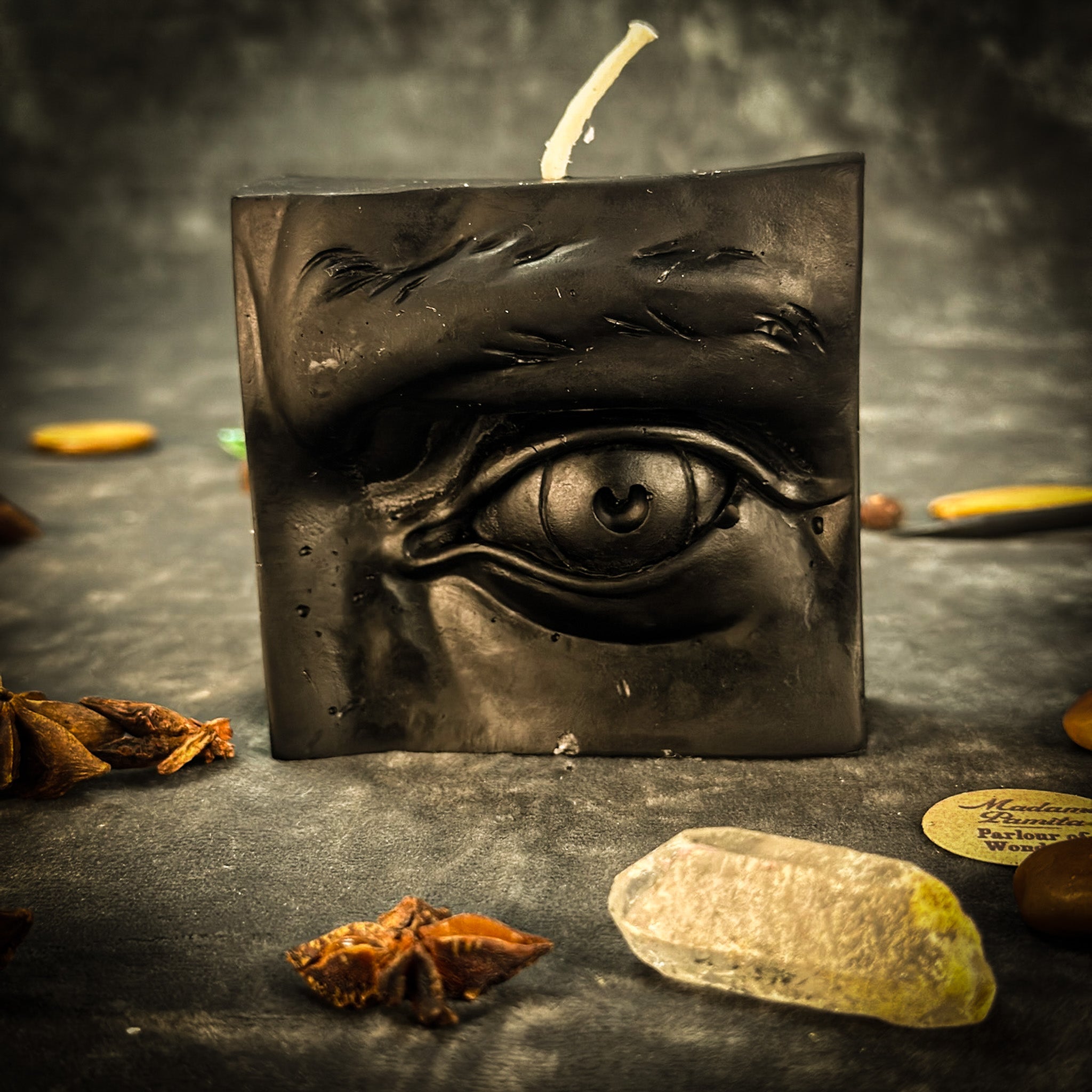 Beeswax Ex-Voto Eye Spell Candle by Parlour of Wonders with orange wax for vision, clairvoyance, and being seen.