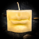 Beeswax Ex-Voto Mouth Spell Candle by Parlour of Wonders, orange beeswax candle for communication, healing, and speaking truth.