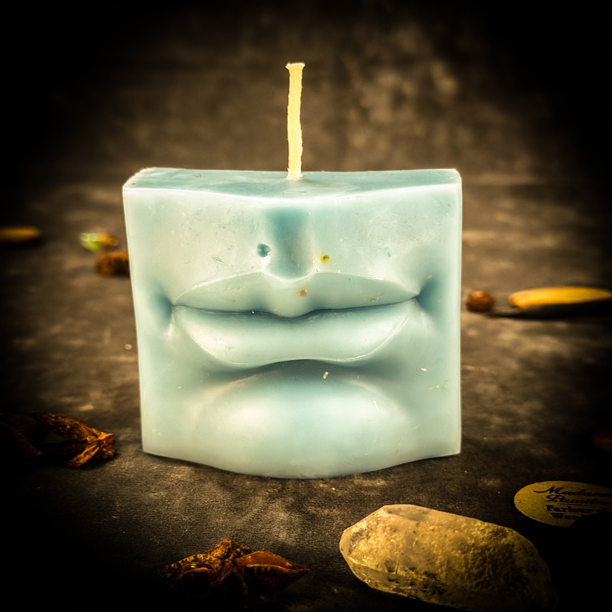 Beeswax Ex-Voto Mouth Spell Candle by Parlour of Wonders, orange beeswax candle for communication, healing, and speaking truth.