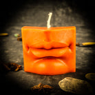 Beeswax Ex-Voto Mouth Spell Candle by Parlour of Wonders with orange wax for communication, healing, and speaking truth.