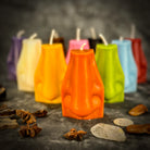 Beeswax Ex-Voto Nose Spell Candle by Parlour of Wonders, orange beeswax candle for clairalience, intuition, and healing.
