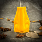 Beeswax Ex-Voto Nose Spell Candle by Parlour of Wonders with orange wax, used for clairalience, intuition, and healing rituals.