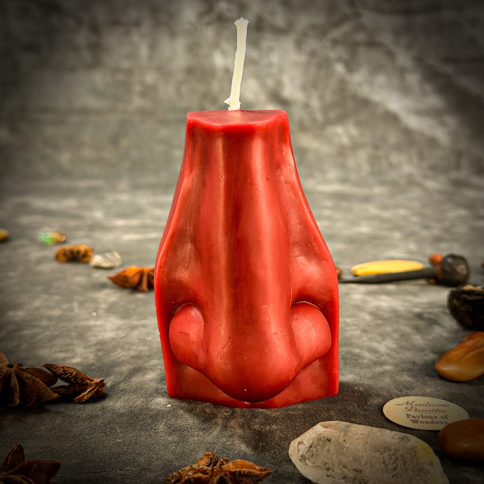 Beeswax Ex-Voto Nose Spell Candle by Parlour of Wonders, featuring an orange beeswax candle with spiritual symbols for intuition and healing.
