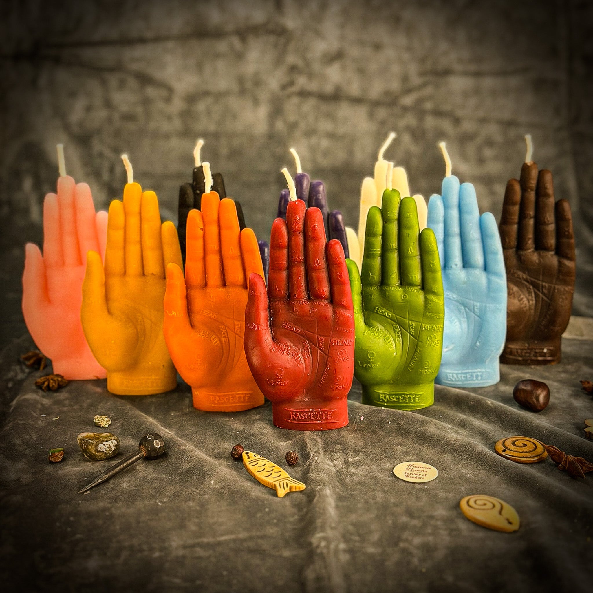 Beeswax Hand of Fate spell candle by Parlour of Wonders, featuring orange wax and symbols for destiny, transformation, and divine timing.