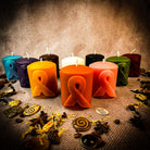 Beeswax awareness ribbon pillar spell candle by Parlour of Wonders, honoring heroes and supporting causes with natural beeswax appearance.