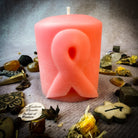 Beeswax awareness ribbon pillar spell candle by Parlour of Wonders, honoring heroes and supporting causes with natural beeswax texture.
