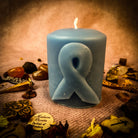 Beeswax Awareness Ribbon Pillar Candle by Parlour of Wonders honoring heroes and supporting causes with natural beeswax texture.