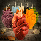 Pink beeswax anatomical heart candle by Parlour of Wonders, designed for love and emotional healing magic.
