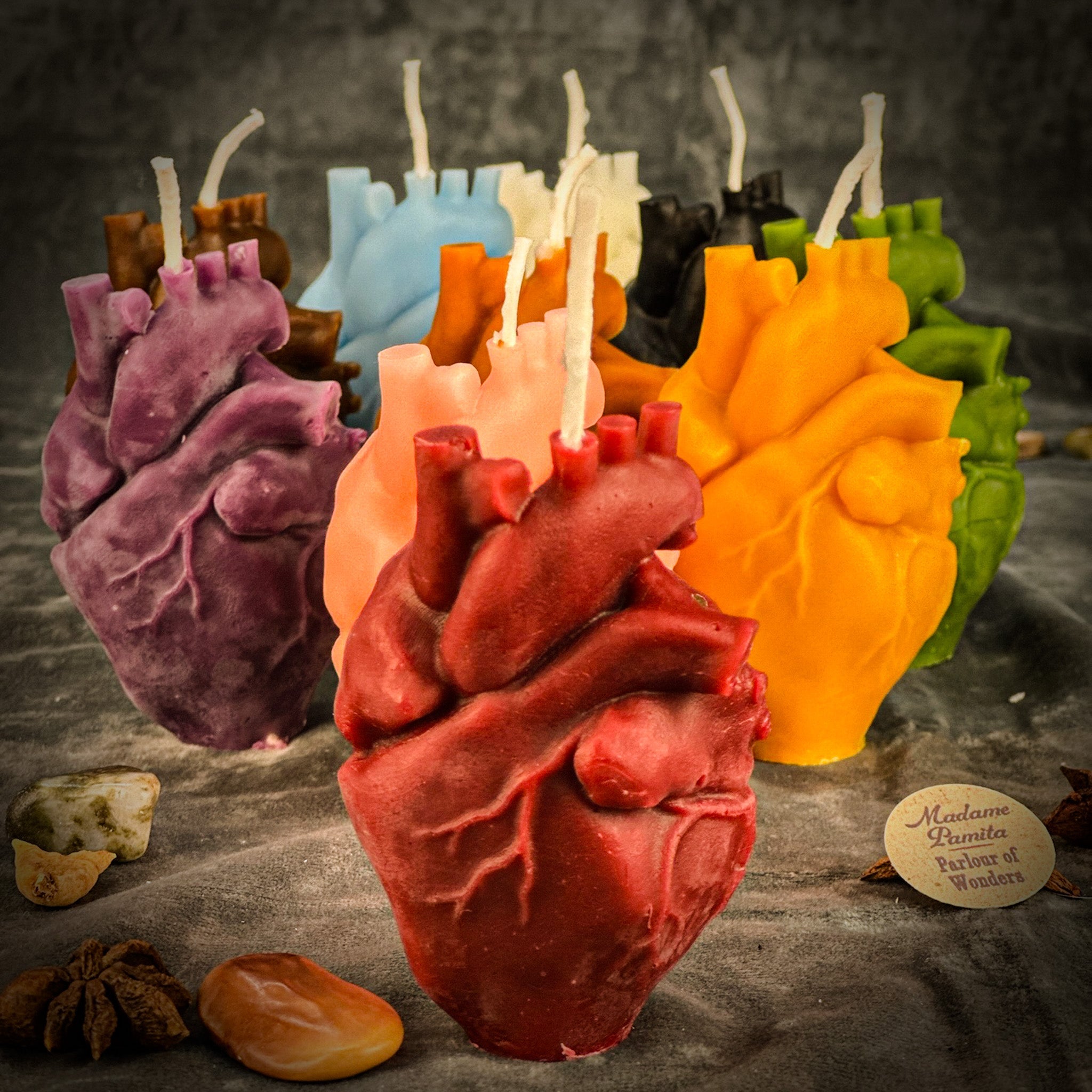 Pink beeswax anatomical heart candle by Parlour of Wonders, designed for love and emotional healing magic.