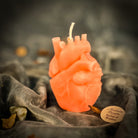 Pink beeswax anatomical heart candle from Parlour of Wonders, designed for love and emotional healing magic.
