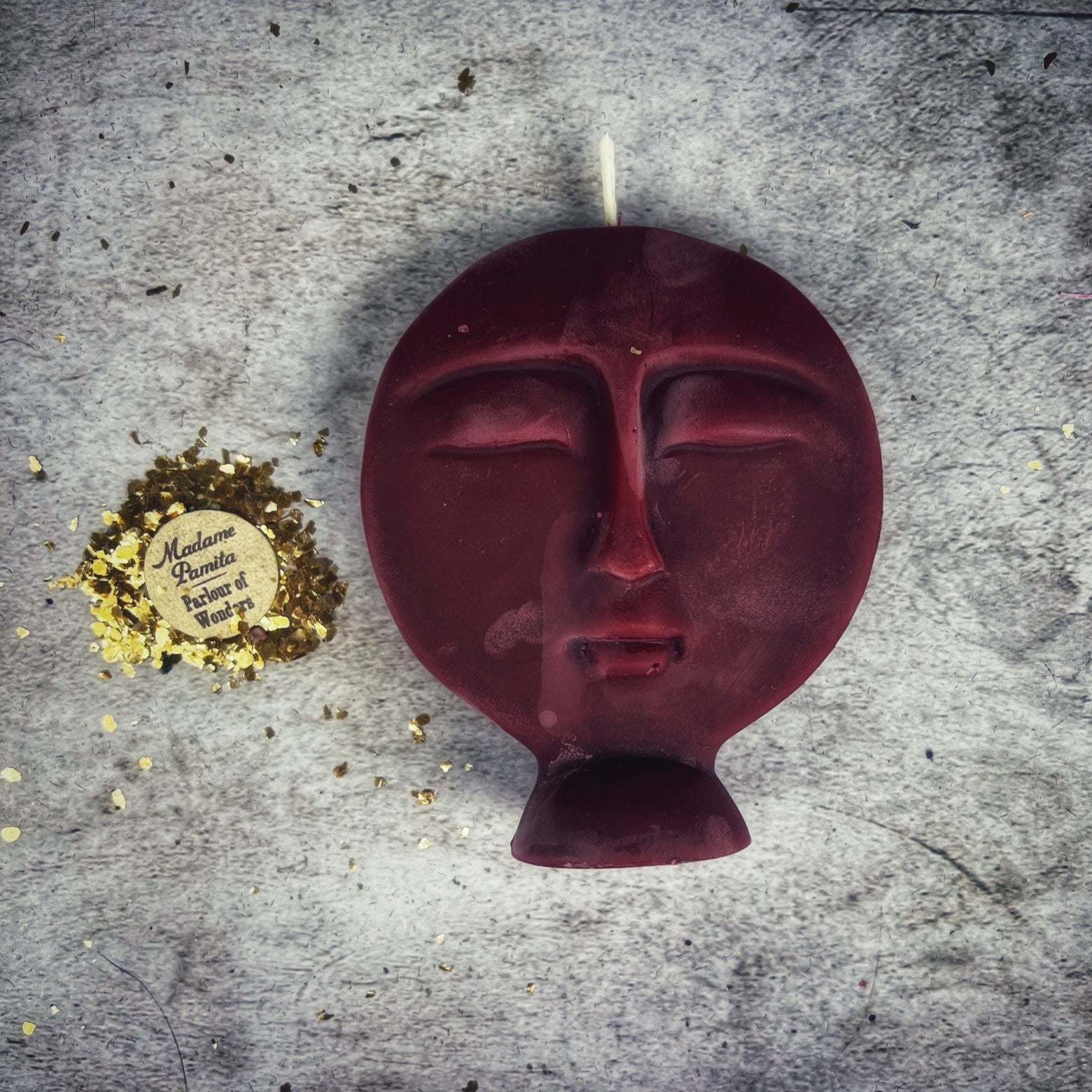 Pink beeswax candle from Parlour of Wonders for ancestral guidance and protection magic, featuring a smooth, natural wax surface.