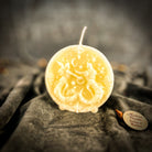 Pink beeswax Gemini Twins zodiac spell candle by Parlour of Wonders, featuring detailed twin symbols for communication and creativity.