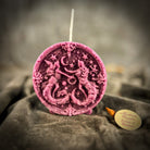 Pink beeswax Gemini Twins zodiac spell candle by Parlour of Wonders, featuring symbols for communication, creativity, and adaptability.