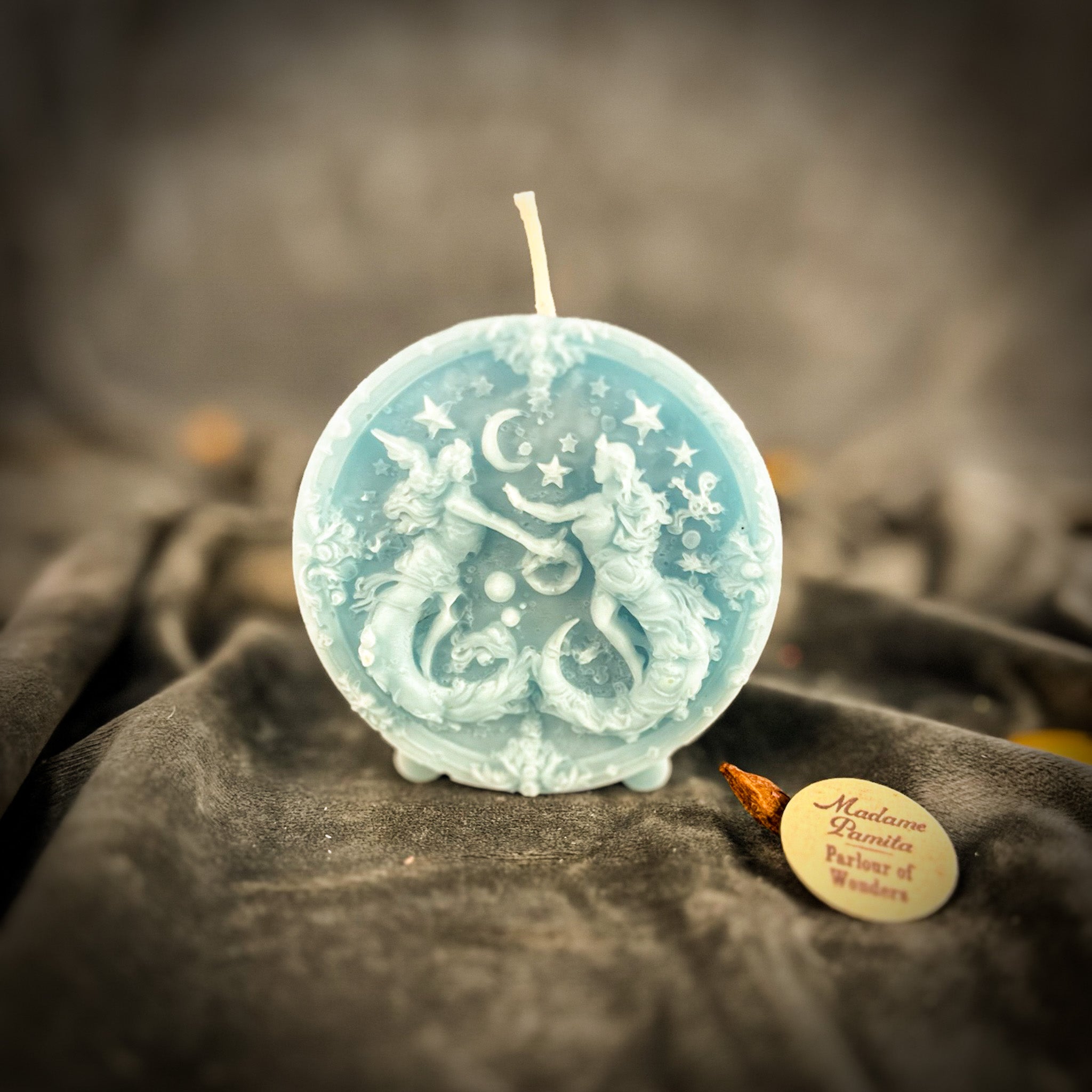 Pink beeswax Gemini Twins zodiac spell candle by Parlour of Wonders for communication, creativity, and adaptability.