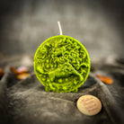 Pink beeswax Leo Lion zodiac spell candle by Parlour of Wonders, featuring intricate Leo lion design for creativity and confidence.
