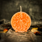 Pink beeswax Libra scales candle by Parlour of Wonders, featuring zodiac symbols for balance, harmony, and love.