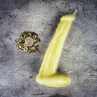 Pink beeswax phallus candle for love and sex magic, featuring intricate wax details, from Parlour of Wonders.
