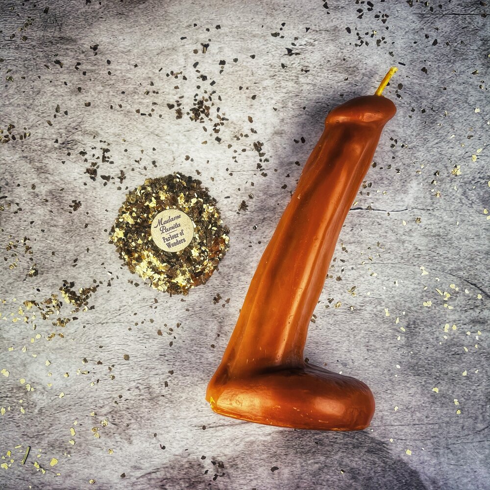 Pink beeswax phallus candle from Parlour of Wonders for passionate love and sex magic rituals, featuring intricate wax details.