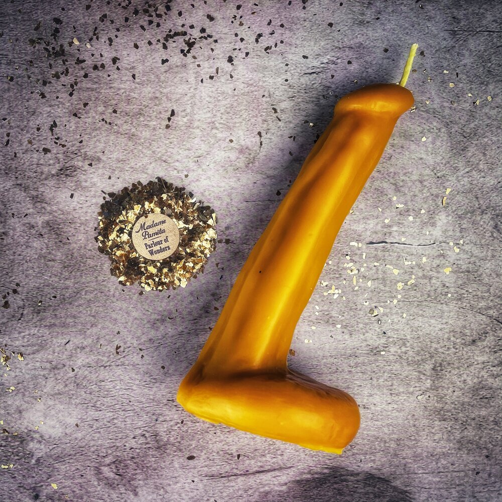 Pink beeswax phallus spell candle by Parlour of Wonders, designed for passionate love and sex magic rituals.