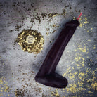 Pink beeswax phallus candle for love and sex magic, crafted by Parlour of Wonders, with intricate details and a passionate design.