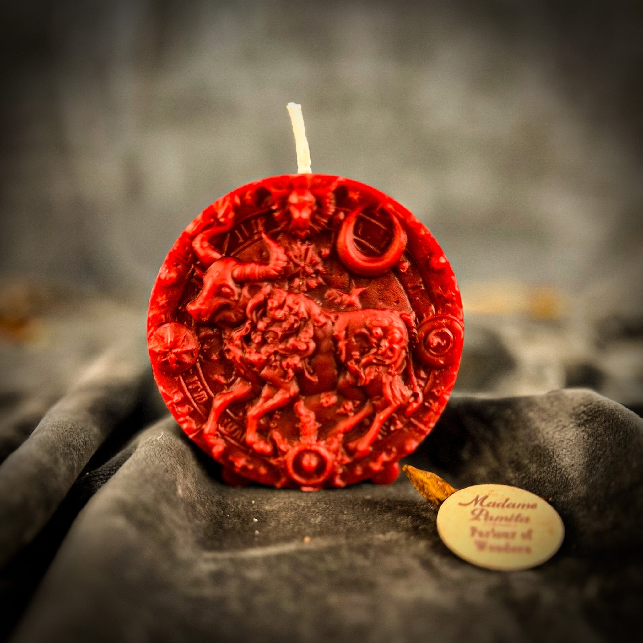 Pink beeswax Taurus Bull zodiac spell candle by Parlour of Wonders, symbolizing abundance, stability, and sensuality.