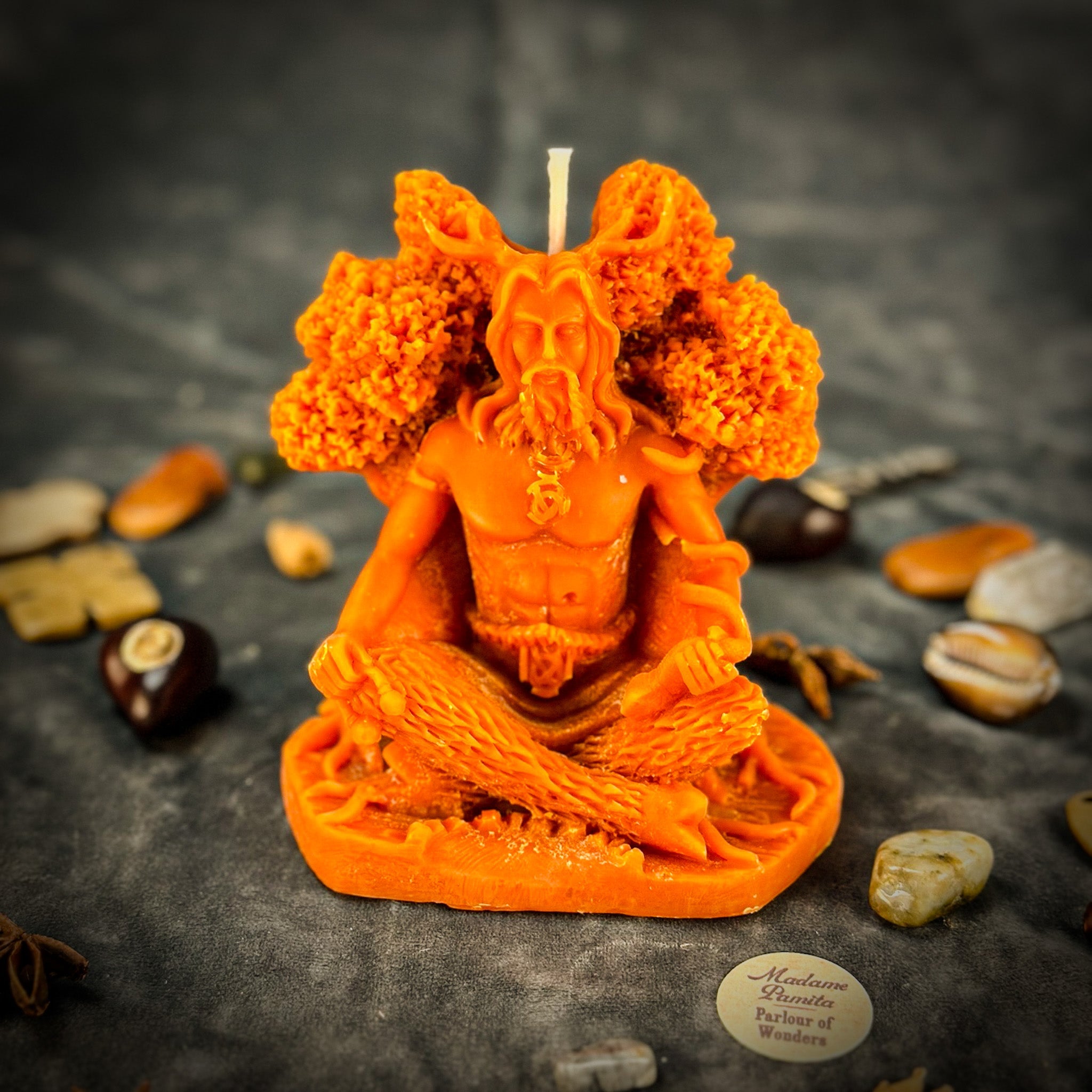 Beeswax Horned God Spell Candle by Parlour of Wonders featuring purple wax and Cernunnos nature magic and fertility symbolism.