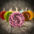 Purple beeswax Pisces fish zodiac spell candle by Parlour of Wonders featuring a Pisces fish design for intuition and dreams.