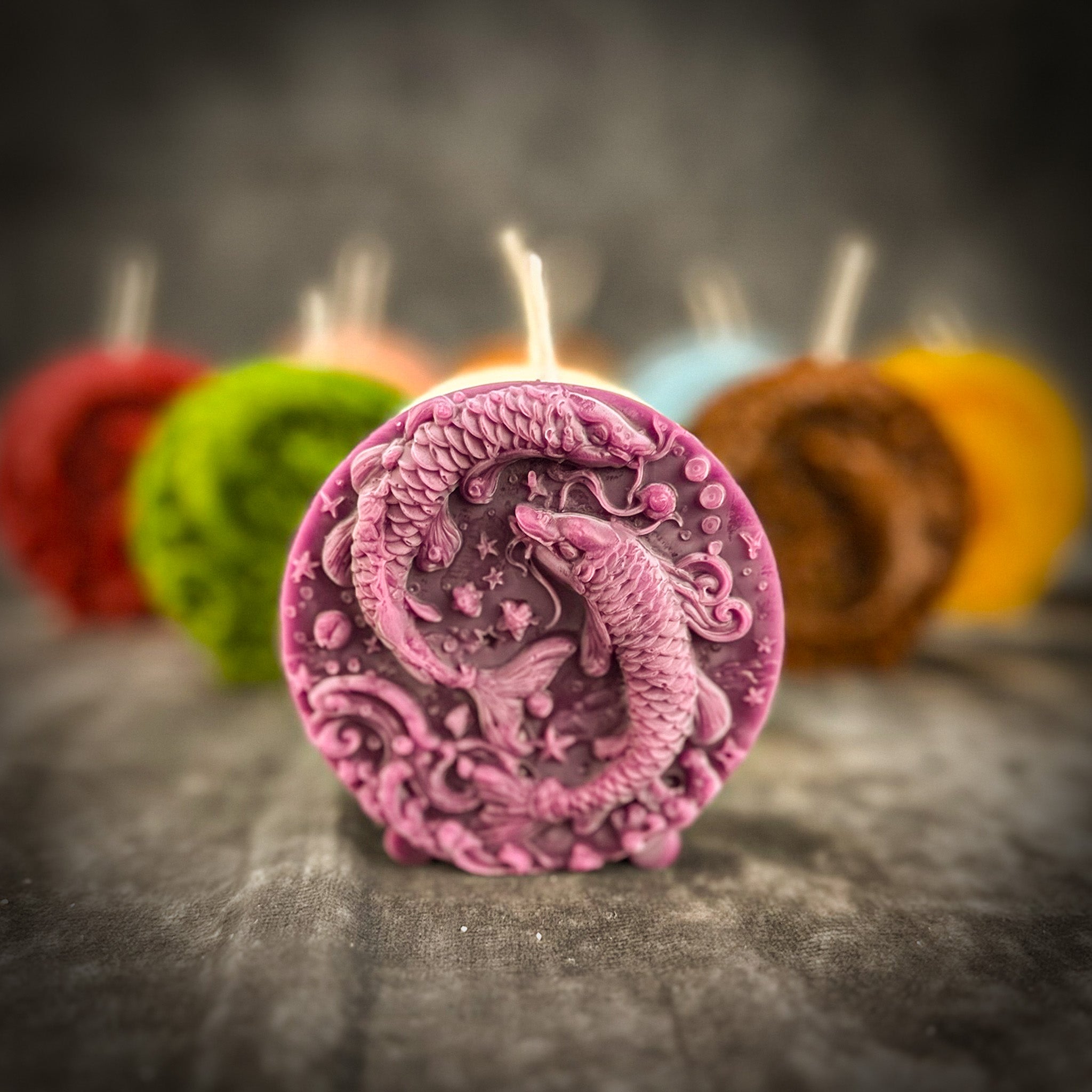 Purple beeswax Pisces fish zodiac spell candle by Parlour of Wonders featuring a Pisces fish design for intuition and dreams.