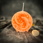 Purple beeswax Pisces fish zodiac spell candle by Parlour of Wonders, featuring intricate fish design for intuition and dreams.
