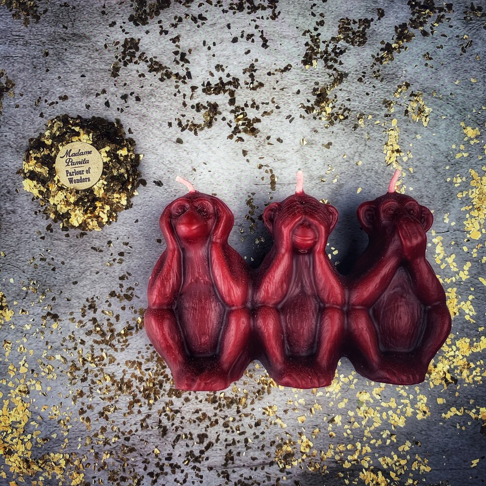 Beeswax Three Wise Monkeys Spell Candle by Parlour of Wonders, featuring red wax and intricate monkey design for magic and protection.
