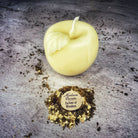 Red beeswax Apple of Avalon spell candle by Parlour of Wonders, featuring a detailed apple shape for love and abundance magic.