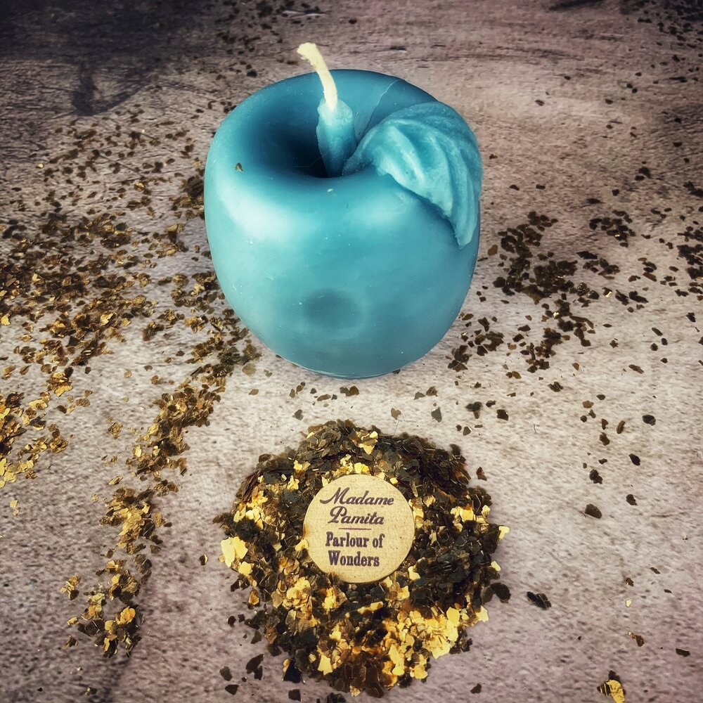 Red beeswax Apple of Avalon spell candle by Parlour of Wonders, featuring a detailed apple design for love and abundance magic.
