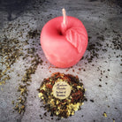 Red beeswax Apple of Avalon spell candle by Parlour of Wonders, used for love and abundance magic.