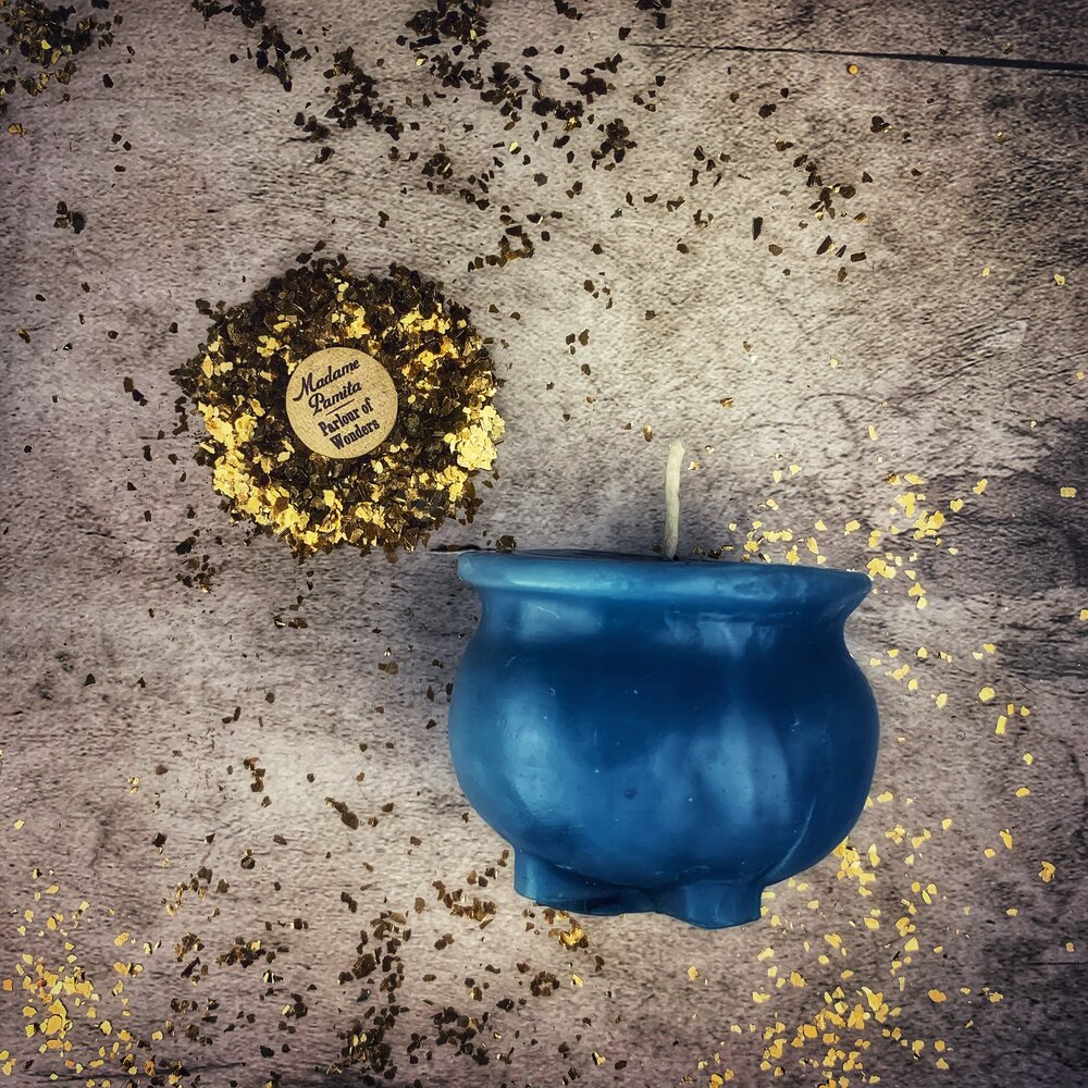 Red beeswax cauldron of magick spell candle by Parlour of Wonders for transformation and positive change magic.